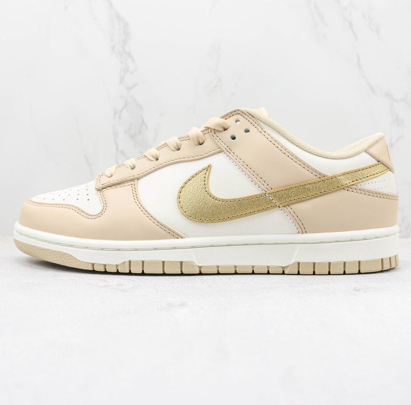 Tênis Nike Dunk Low ‘Metallic gold’