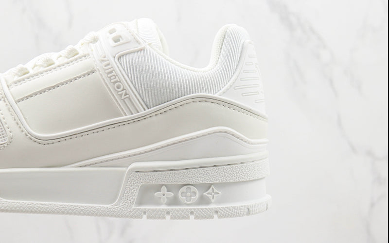 Tênis Louis Vuitton Trainer ‘Triple White’