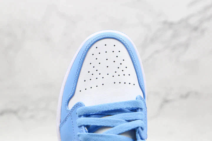 Tênis Nike Air Jordan 1 Low Unc