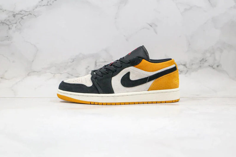 Tênis Nike Air Jordan 1 Low University Gold Black